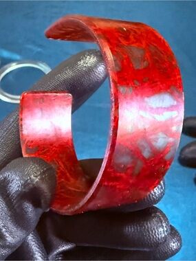 beautiful hand crafted half bangle in stunning red and clear. super lightweight
